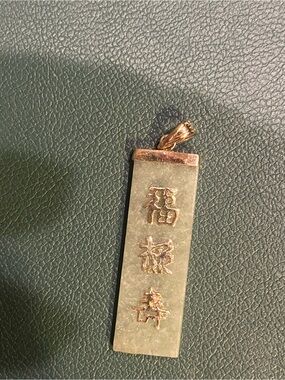 14k gold and jade Asian pendent